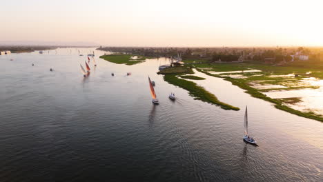 white sail of felucca boat on calm nile waters