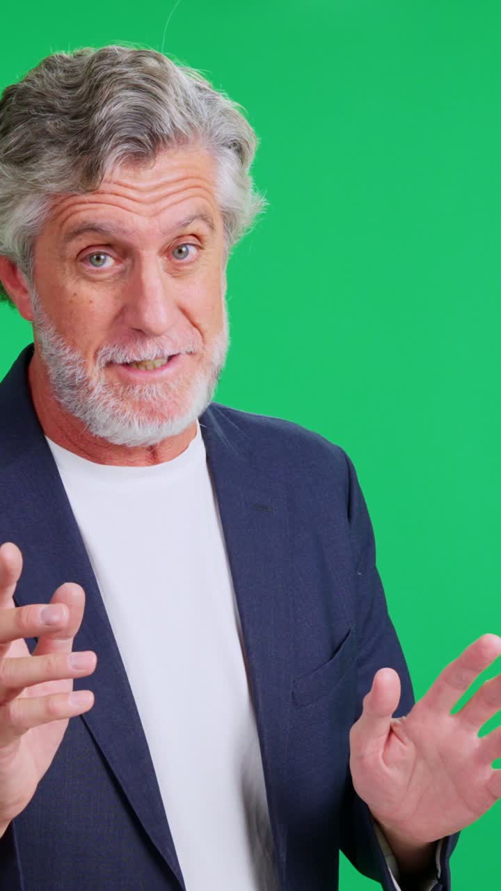 Senior Man Speaking and Gesturing on Green Screen