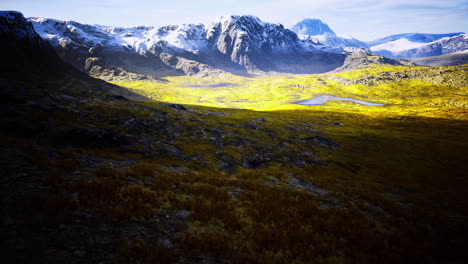 landscape with mountains and a serene lake at golden hour in the wilderness
