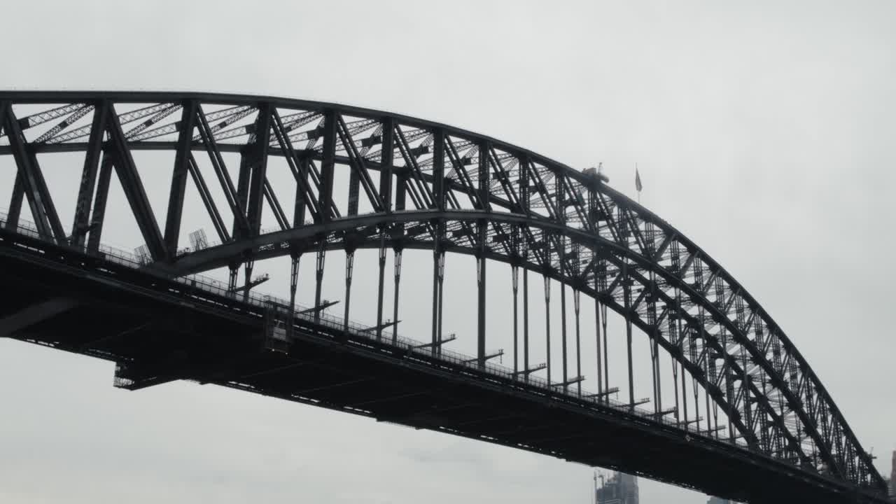 Sydney Harbour Bridge On A Cloudy Day From Sydney Harbour In Sydney, New South Wales, Australia