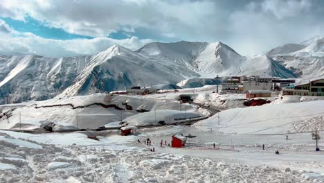 view of the ski slope against the backdrop of mountain peaks