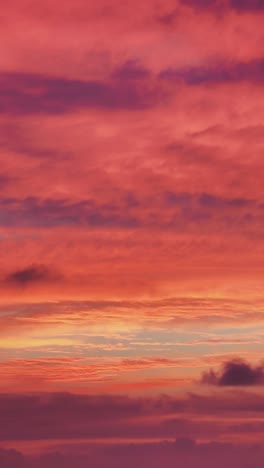 stunning sunset sky filled with shades of purple, orange and blue, creating a beautiful and serene cloudscape