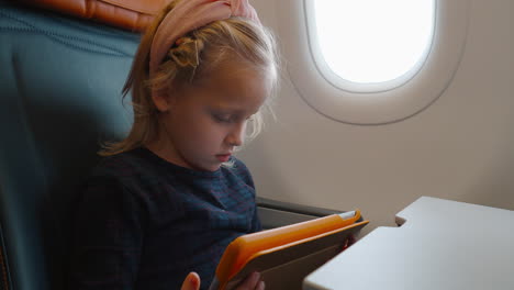 little girl on the plane