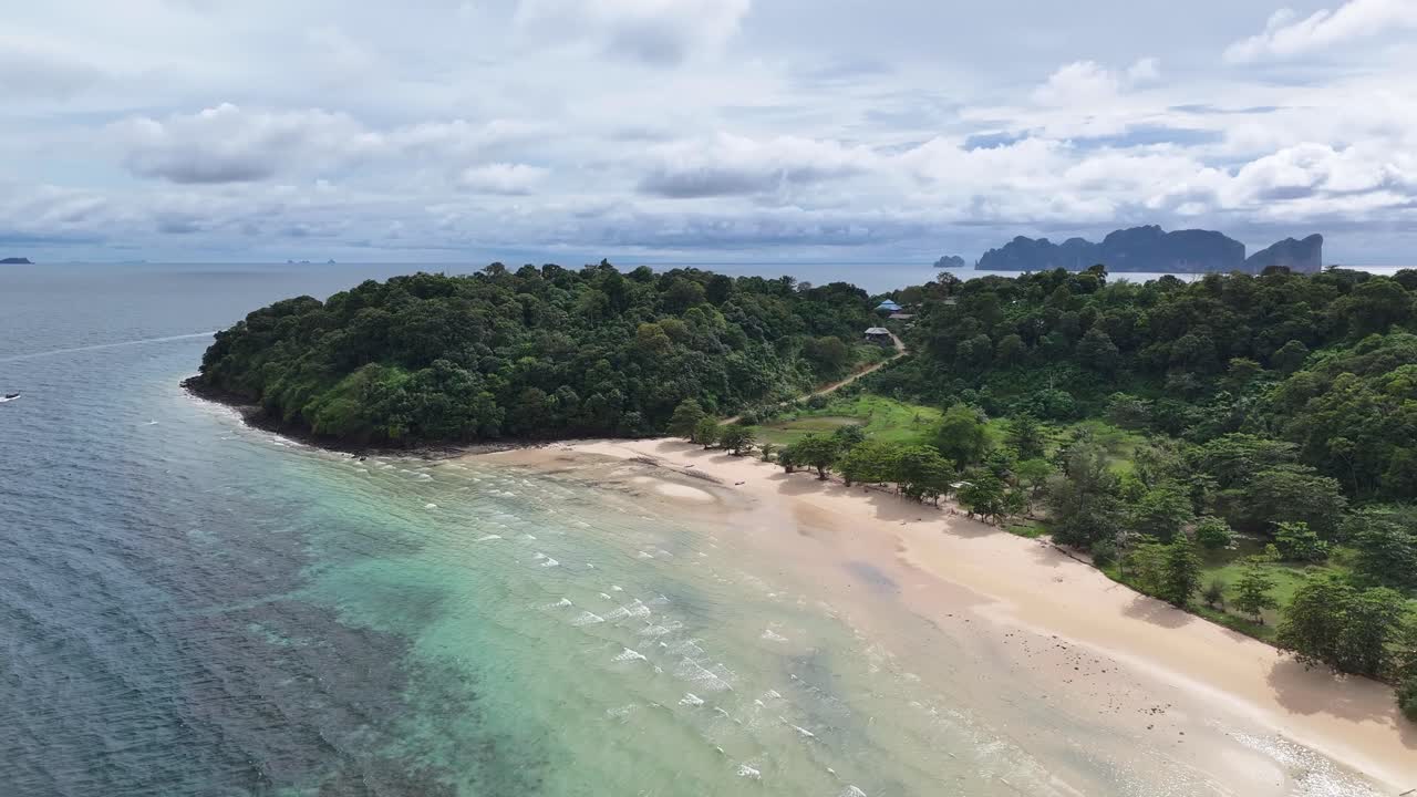 Beautiful aerial of Loh Moo Dee beach with lush green vegetation, dreamy vibe, exotic travel. Thailand