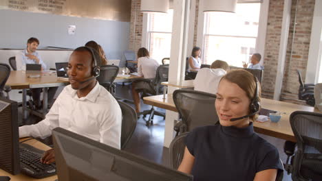 Slow-Motion-Shot-Of-Staff-In-Customer-Service-Department