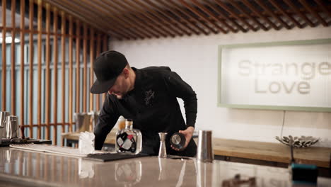 bartender preparing drinks at a bar