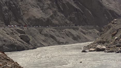 Hunza valley Pakistan dangerous road traffic polluted river water, nature landscape