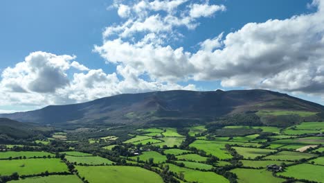 comeragh mountains waterford aerial flying right over fertile farmlands on a warm summer evening