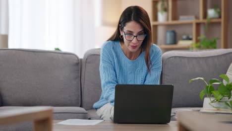 woman working on laptop at home