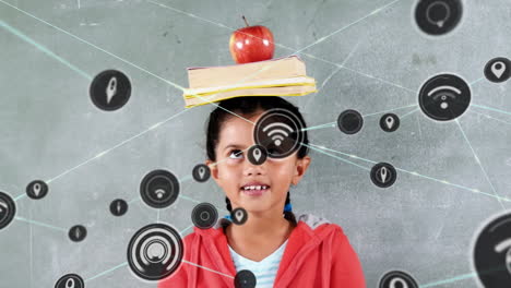 animation of network of icons over biracial girl balancing books and apple on her head at school