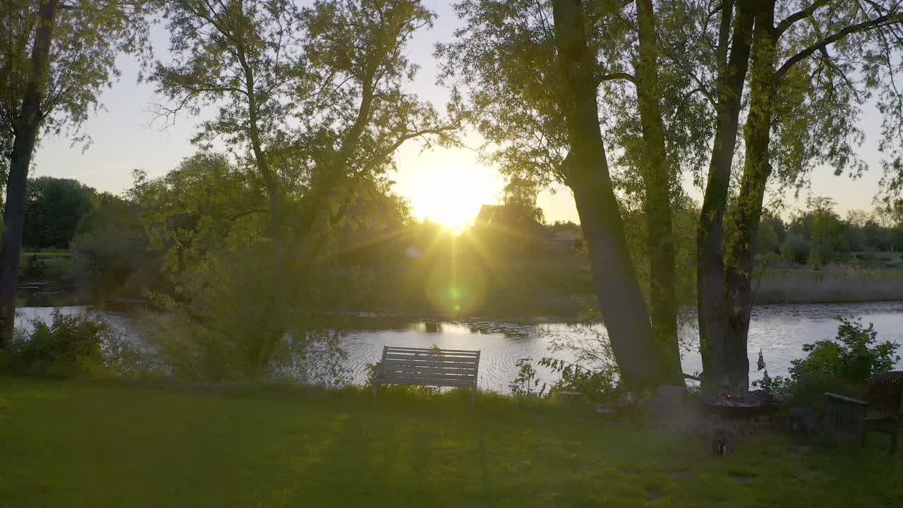 Sunset over a romantic bench