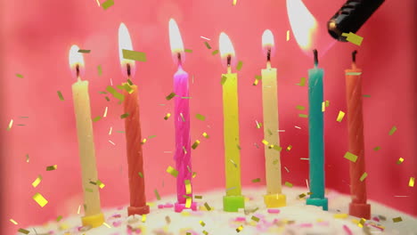 lit birthday candles with confetti animation on pink background