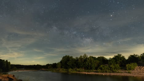 Timelapse-of-the-Milky-Way-core-rising-over-the-Llano-River-outside-of-Mason,-Texas