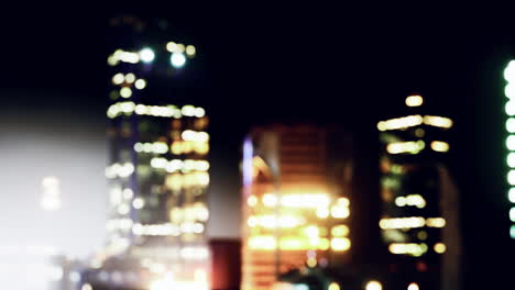 blurred cityscape background scene at night