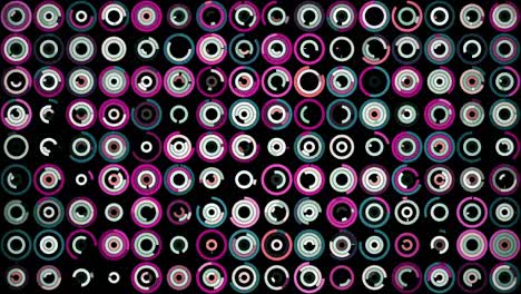 plenty of small multicolored circles spinning on the black background in different sequence. animation. beautiful abstract background