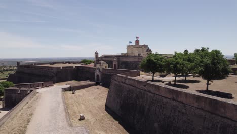 Aerial-pullback-over-Santa-Luzia-Fortress-walls,-Elvas,-Alentejo