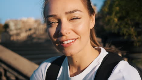 Close-up-view-of-soccer-woman-with-football-in-the-stairs-outdoors.