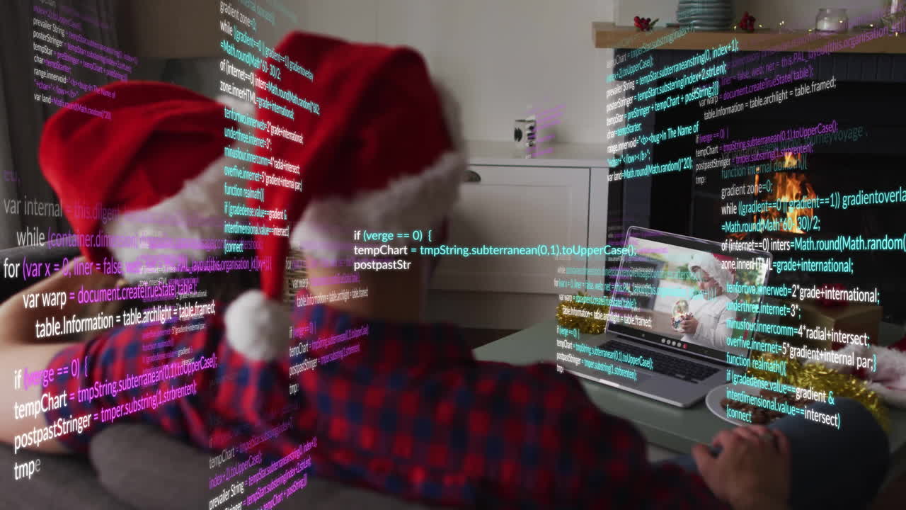 Person wearing Santa hat viewing laptop with colorful code animation overlay