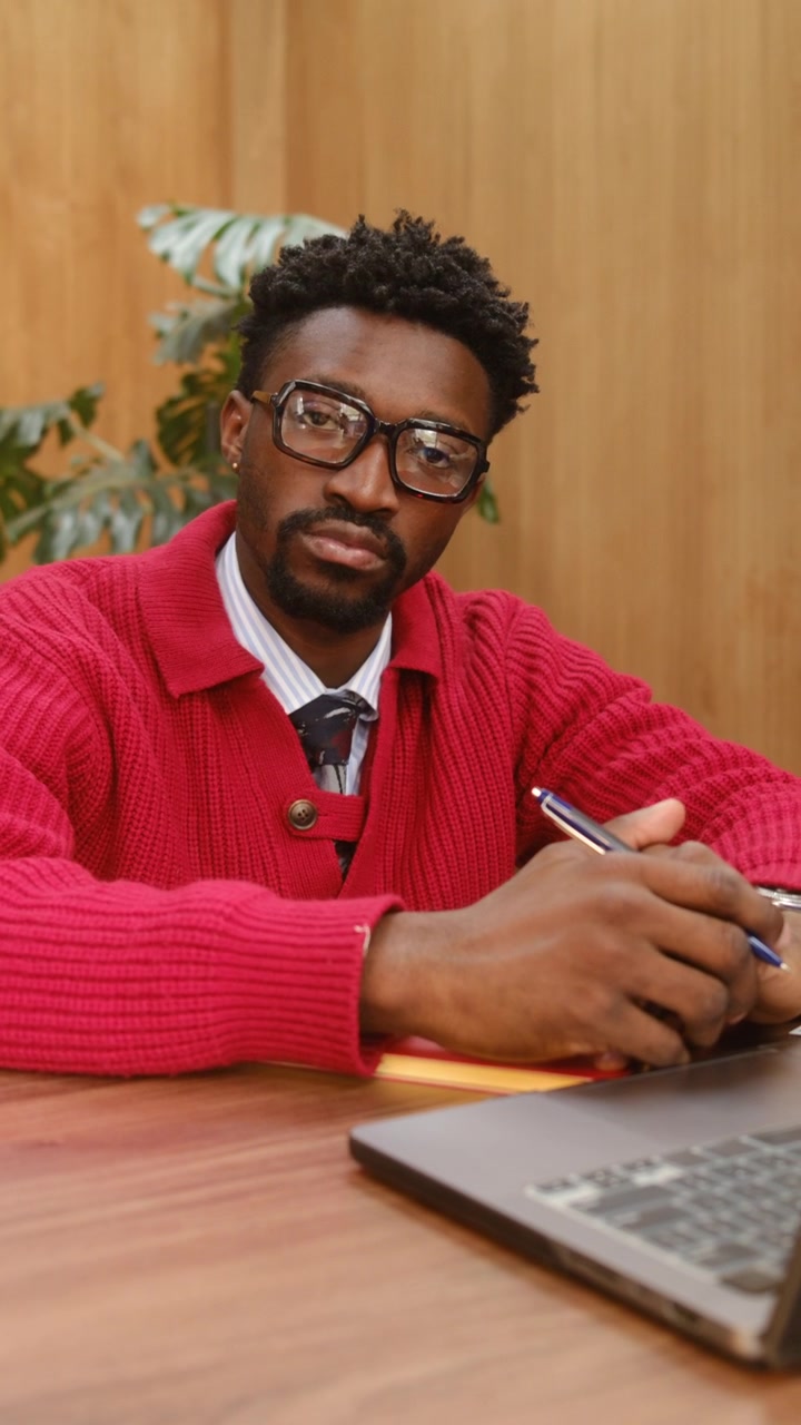 Portrait of Intellectual African American Businessman at Office Workplace
