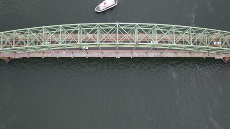 an aerial shot of the fire island inlet bridge on long island, ny