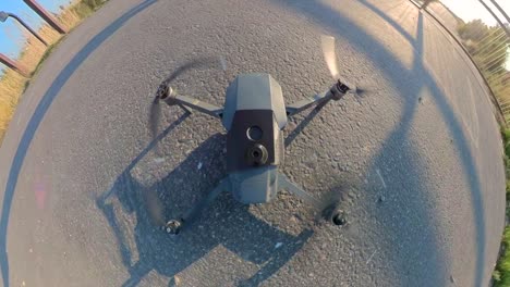 landing a drone pov of it hitting the ground and the propellors turning off