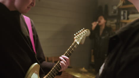 musical group in a studio