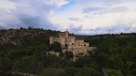 aerial pedestal rises above picturesque chateau comtal, provence france