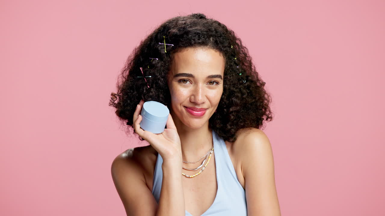 Young Woman Promoting Skincare Product