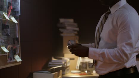 detective investigating crime scene