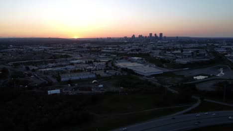 awe-inspiring drone shots of golden hour in downtown calgary's industrial area