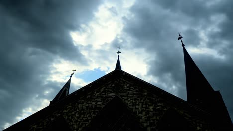 silhouette of a church with three steeples