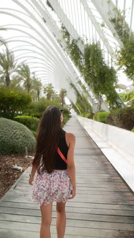 woman walking in a modern park