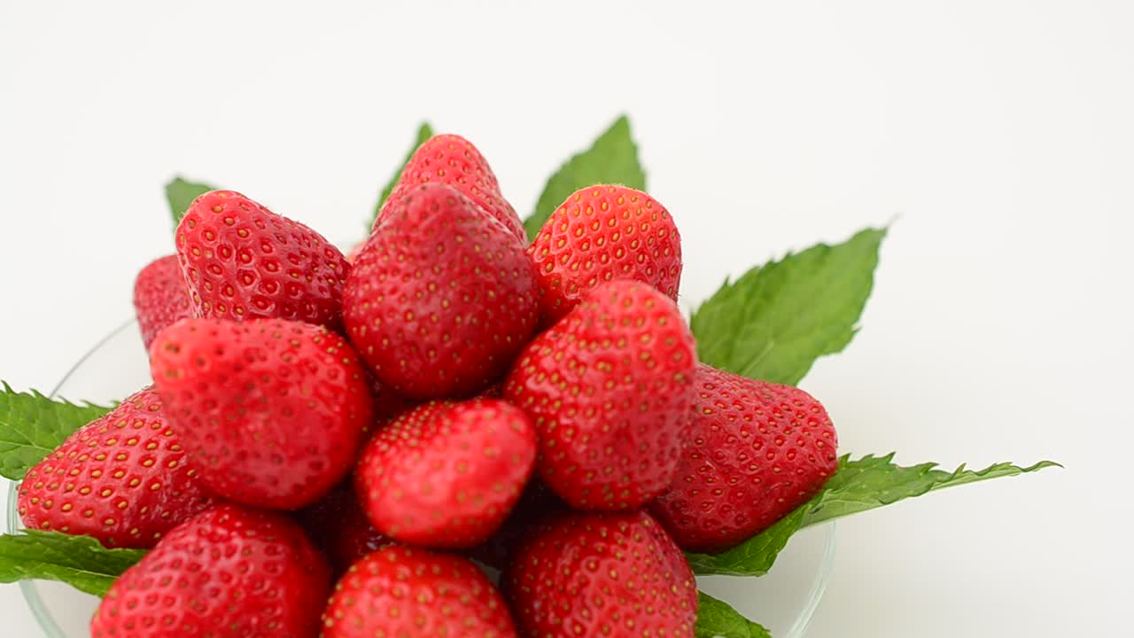 Strawberry on a white background, isolate. Shooting in the movement