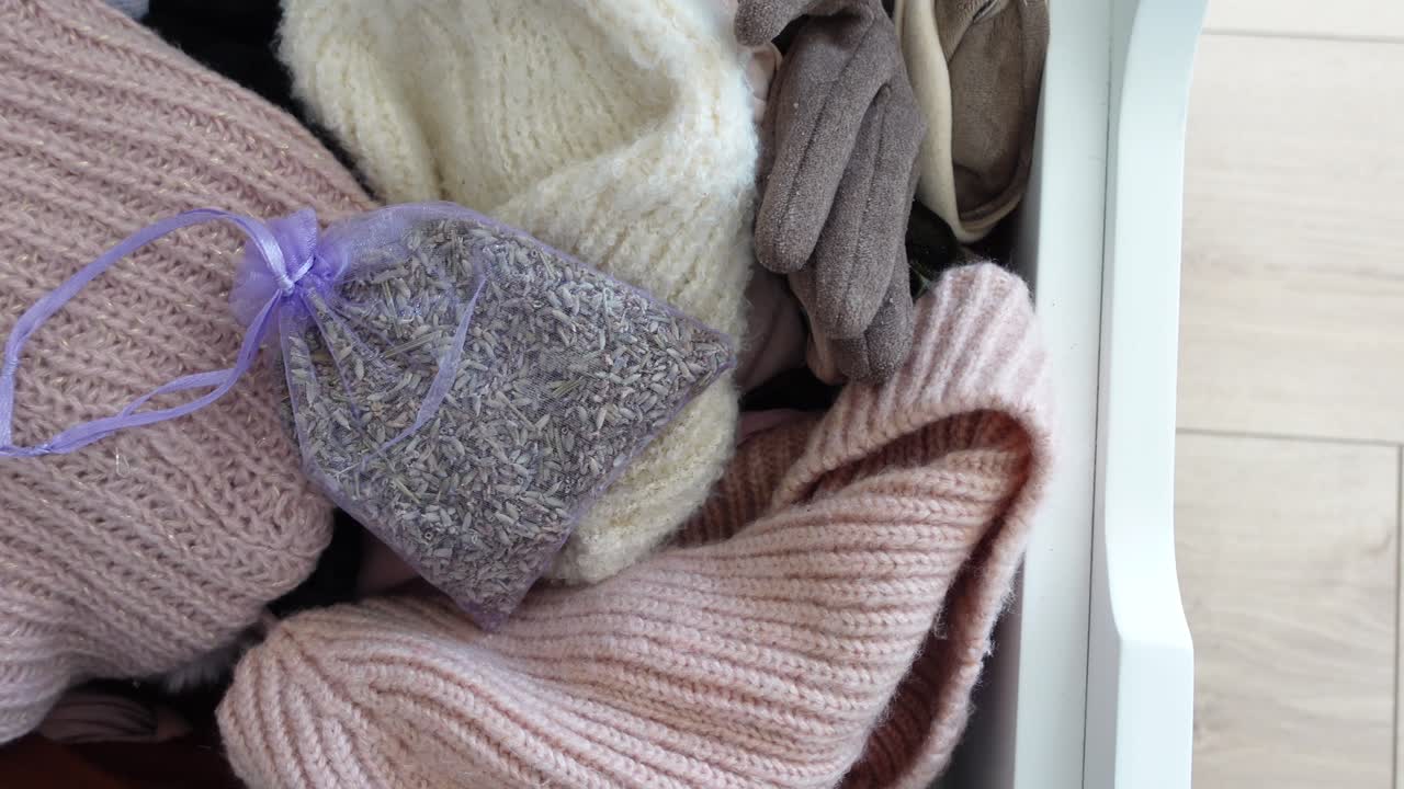 Drawer with Lavender Sachet and Knitted Items