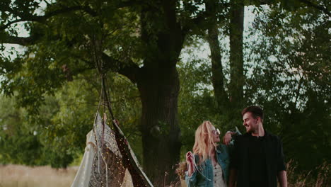 Joyful-Couple-Walking-And-Smiling-Outdoors-In-Summer