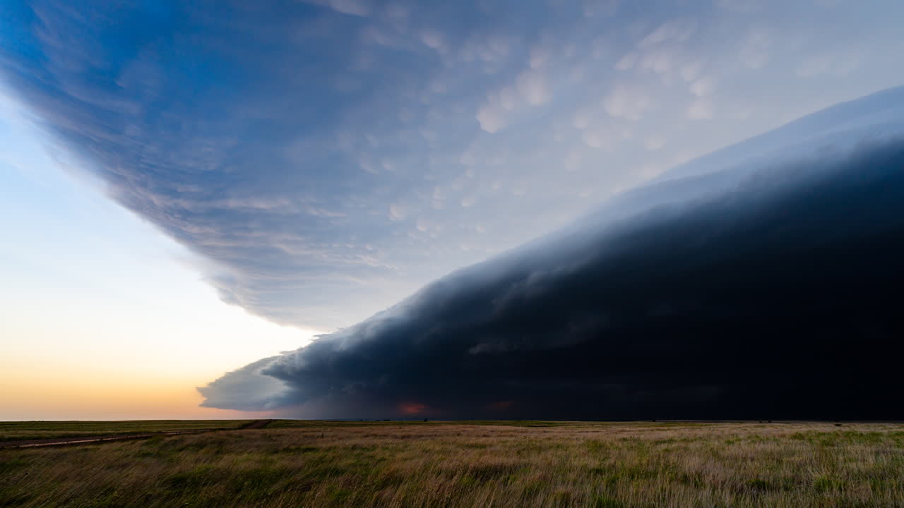 Amazing storm clouds creeping closer in a dark and powerful weather scene