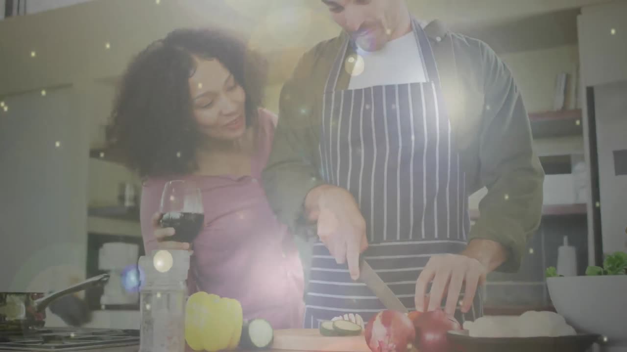 animación de una pareja diversa cocinando en la cocina sobre puntos de luz