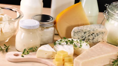 various dairy items arranged on a wooden surface