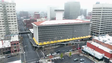 Wide-drone-shot-of-the-Parkade-Plaza-Parking-Garage-in-Spokane,-Washington