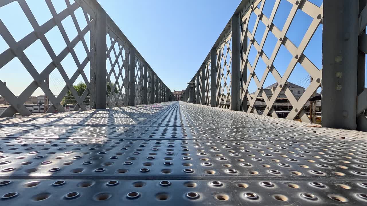 A walk along a metal bridge