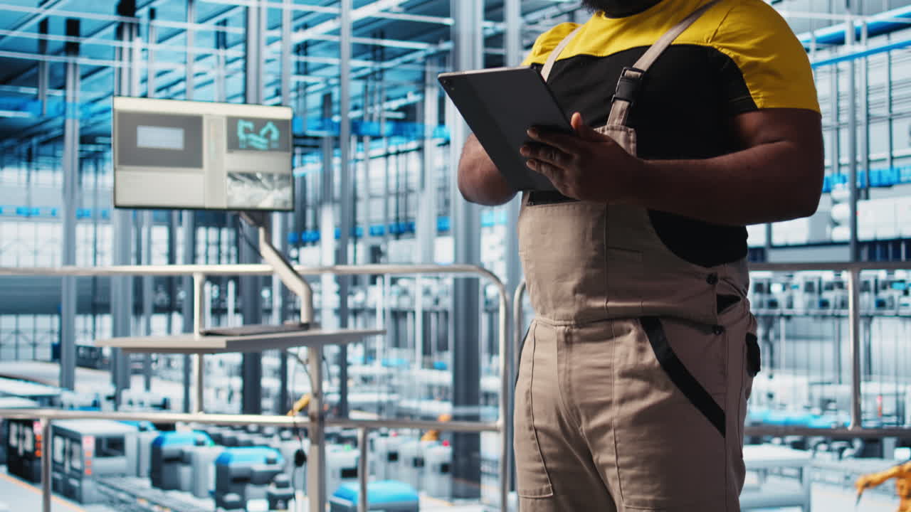 Photovoltaics smart factory specialist analyzing data using tablet