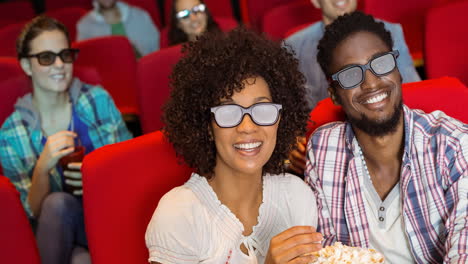 animation of happy diverse group of people eating popcorn in cinema