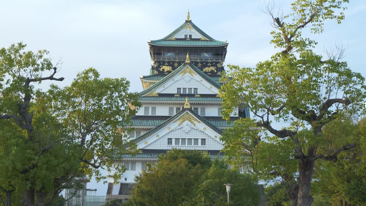 Famous Ornate Tiered Main Tower Of Osaka Castle In Japan. Static Shot