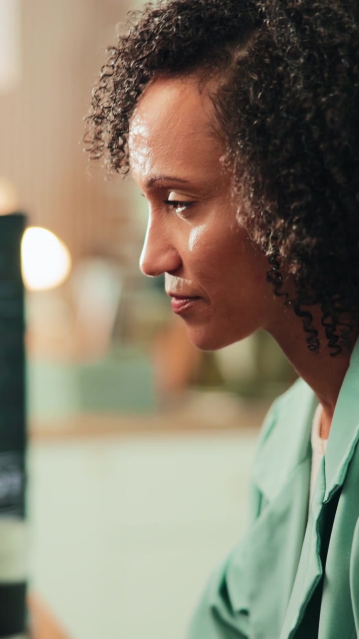 Focused Woman Working on Computer in Office
