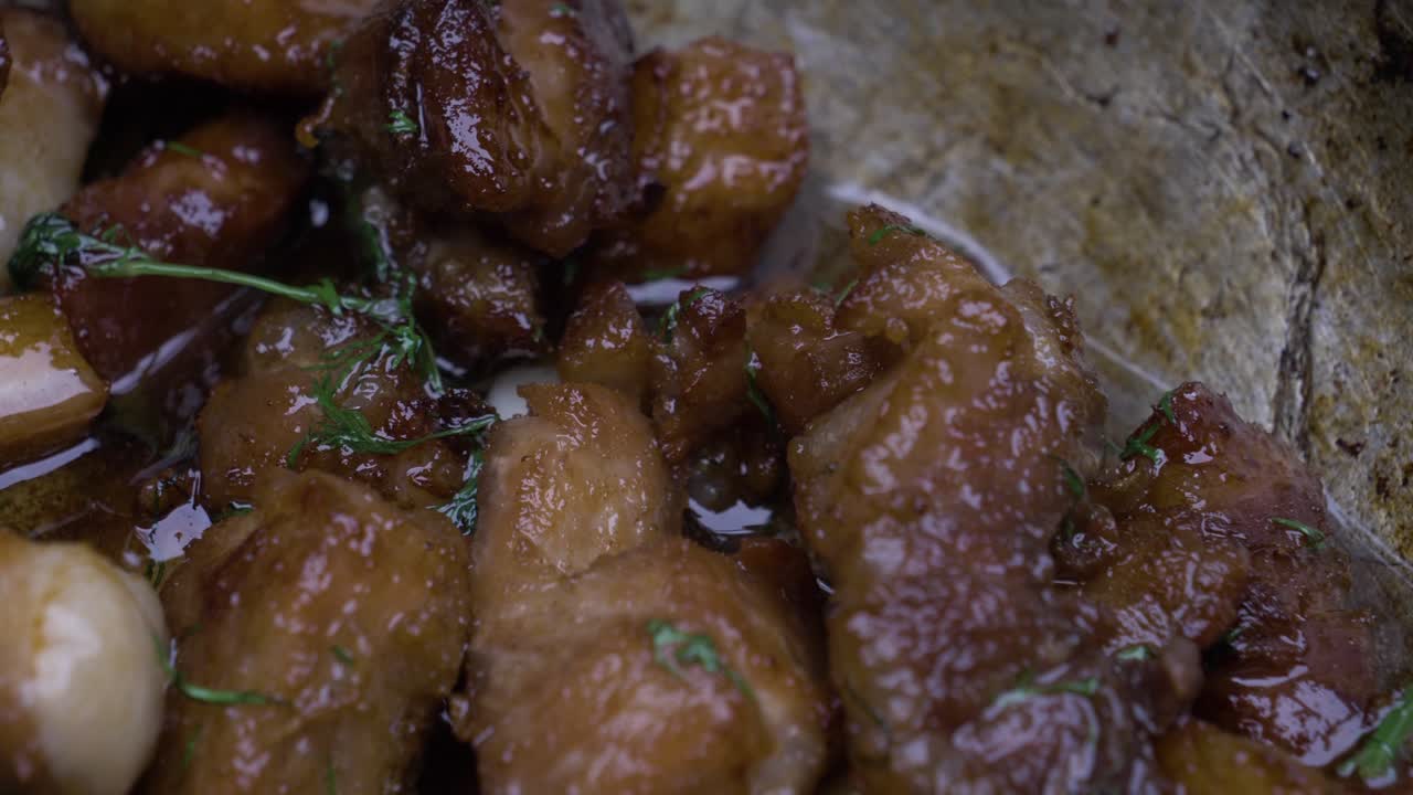 Cooking in nature a traditional Romanian recipe, pig alms, made from pork in a cauldron with lots of greens. The food is juicy and causes appetite.