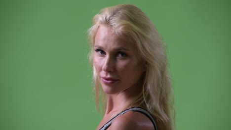 young beautiful woman looking back ready for gym