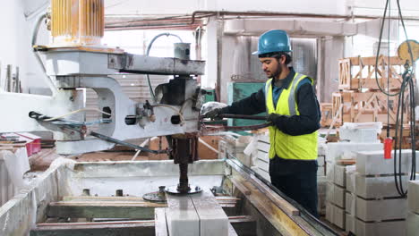 man polishing marble