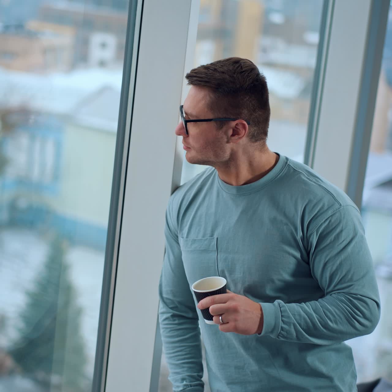 Young confident businessman having coffee. Businessman drinking delicious coffee