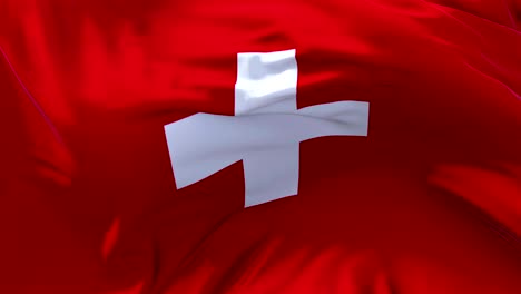 switzerland flag in slow motion classic flag smooth blowing in the wind on a windy day rising sun 4k continuous seamless loop background