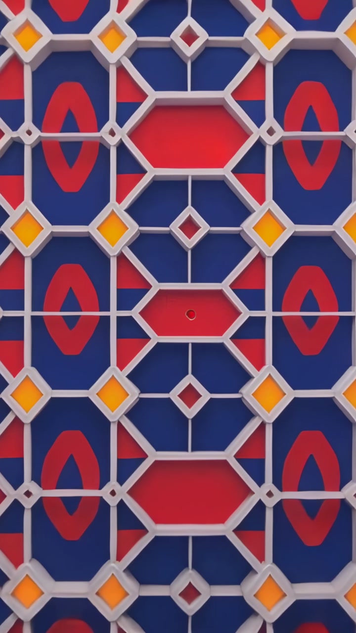 Vertical video: Zooming camera moving up on lobby panel, showing white lattice, blue red panels